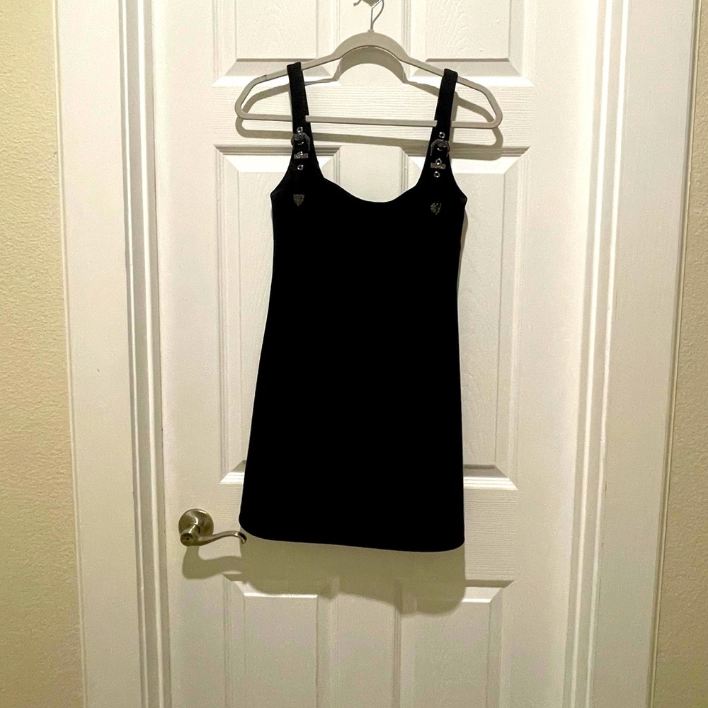 Black Sleeveless Dress with Button Accents